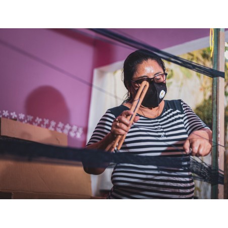 Artisan mexicain fabriquant un hamac