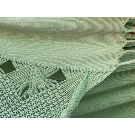Tissu vert pastel en coton épais d’un hamac artisanal colombien