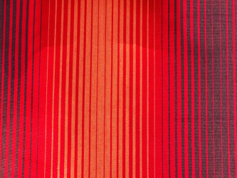 Zoom sur la texture rayée du tissu d'un hamac