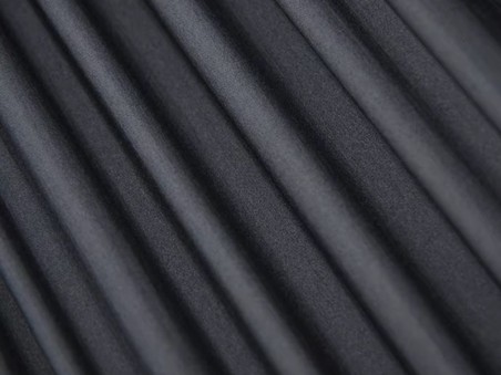 Gros plan sur la texture du tissu technique noir du hamac Adventure Ultra Light