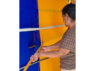 Artisan colombien fabriquant un hamac