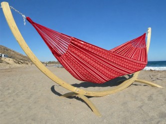 Maya XXL red polygon freestanding hammock located by the sea